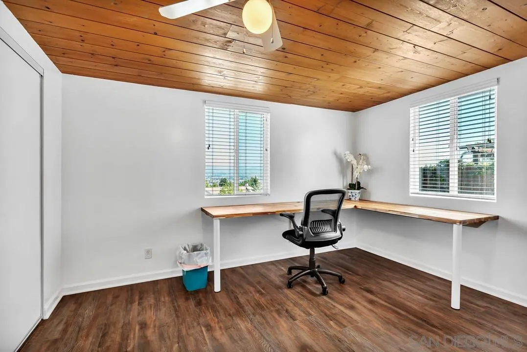 1509 Honey Hill Road El Cajon, CA 92020 - Photo 30 of 49 a view of a workspace with furniture and a window