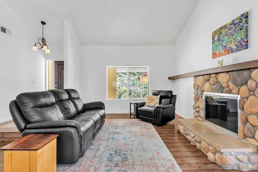 1509 Honey Hill Road El Cajon, CA 92020 - Photo 6 of 49 a living room with furniture and a fireplace
