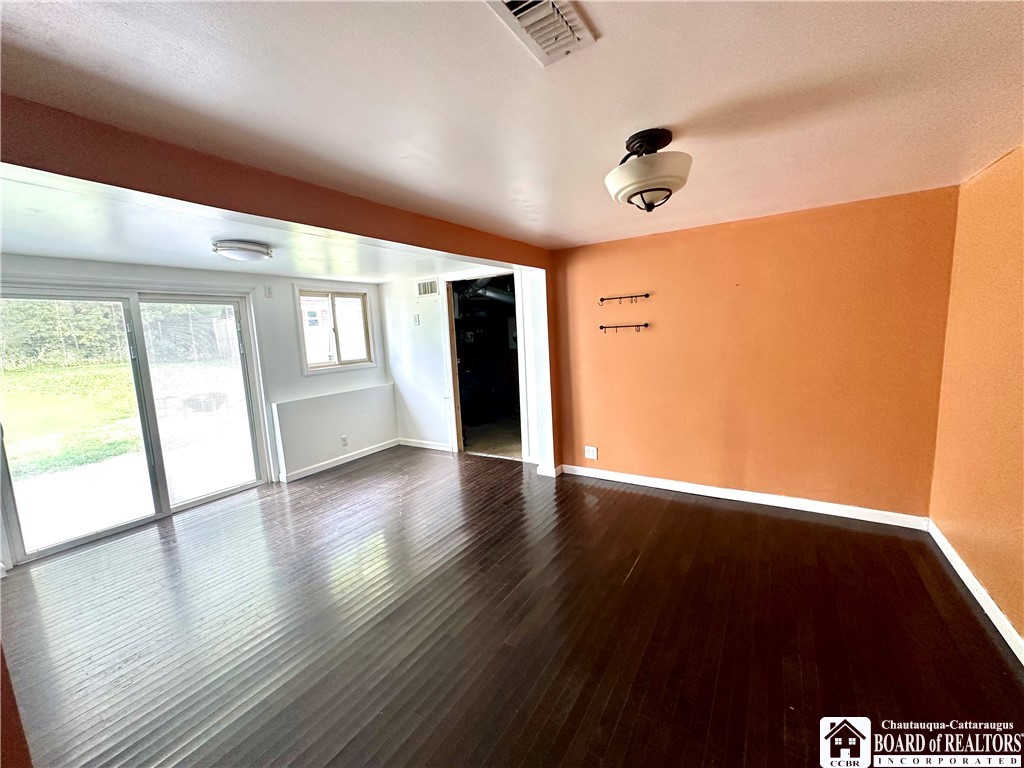 650 Queen Street Olean, NY 14760 - Photo 4 of 34 Dining Room/Living Room with Sliding glass doors o