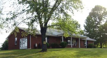 3111 Nemmo Road Vinton, VA 24179 - Photo 1 of 15 front view of a house with a tree in a yard