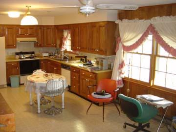 3111 Nemmo Road Vinton, VA 24179 - Photo 5 of 15 a kitchen with a table chairs sink and cabinets