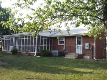 3111 Nemmo Road Vinton, VA 24179 - Photo 8 of 15 a view of a house with a yard and a large tree