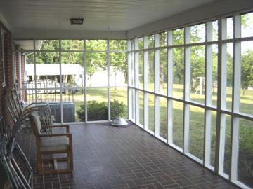 3111 Nemmo Road Vinton, VA 24179 - Photo 10 of 15 a view of porch with a floor to ceiling window and wooden fence