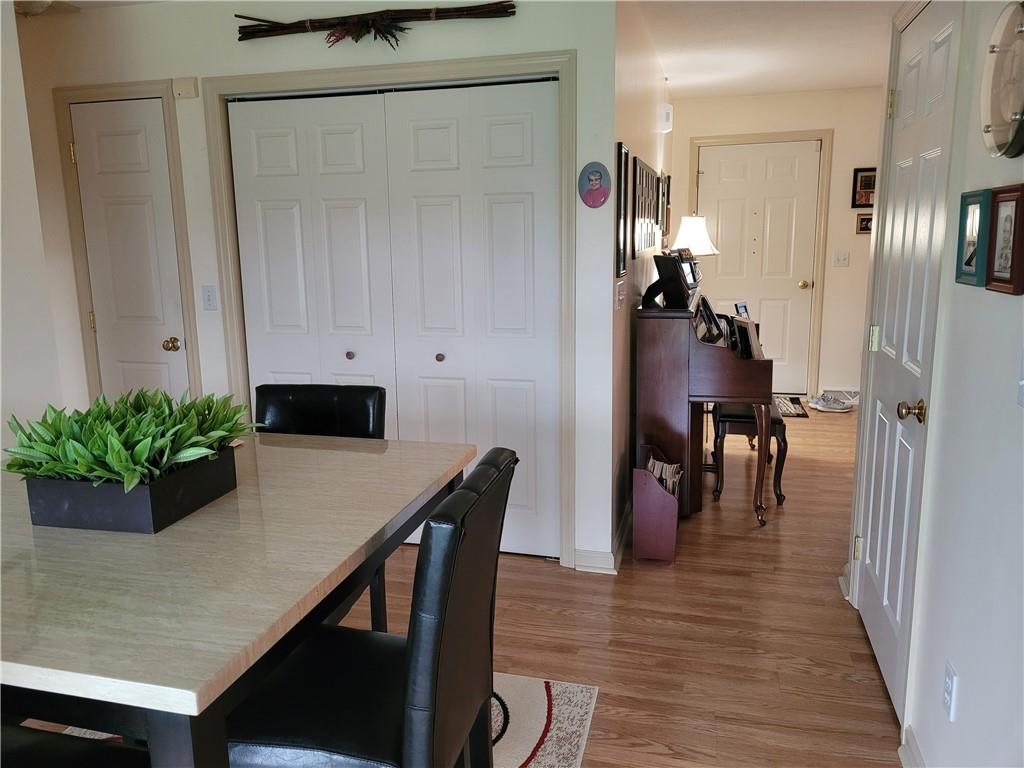 662 Great Belt Road Butler, PA 16002 - Photo 11 of 25 a dining room with furniture and wooden floor