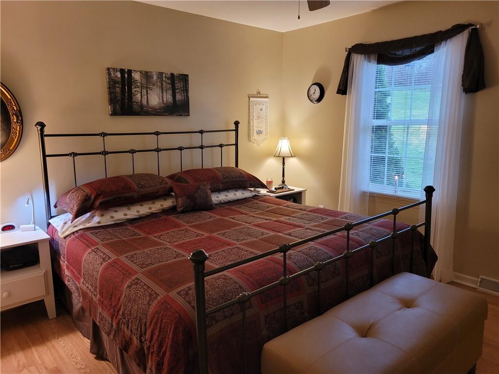 662 Great Belt Road Butler, PA 16002 - Photo 13 of 25 a bedroom with a bed and a window