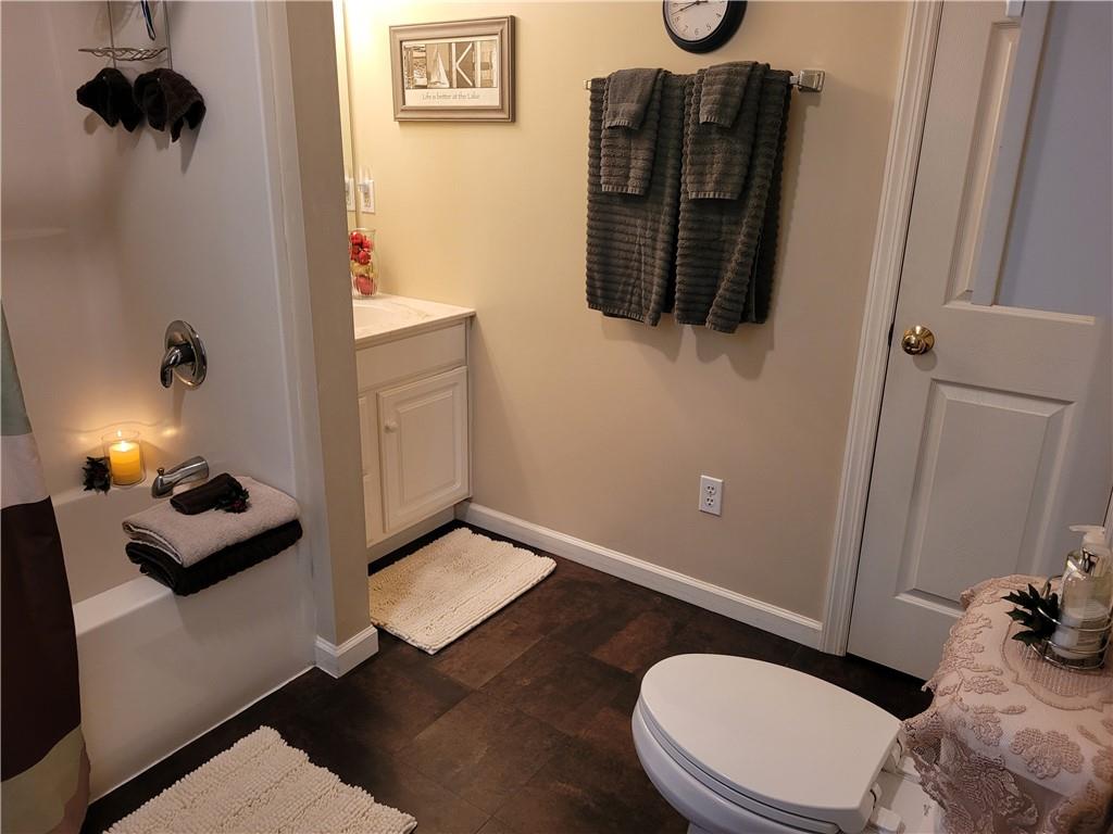 662 Great Belt Road Butler, PA 16002 - Photo 15 of 25 a bathroom with a toilet a sink and mirror