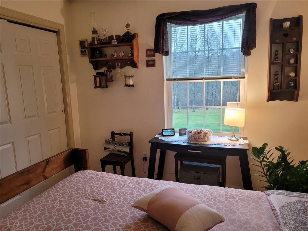 662 Great Belt Road Butler, PA 16002 - Photo 17 of 25 a bedroom with a bed and a window