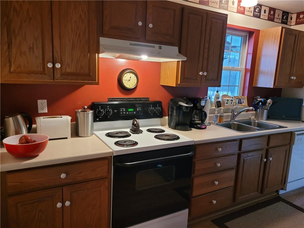 662 Great Belt Road Butler, PA 16002 - Photo 19 of 25 a kitchen with stainless steel appliances granite countertop a sink a stove and cabinets