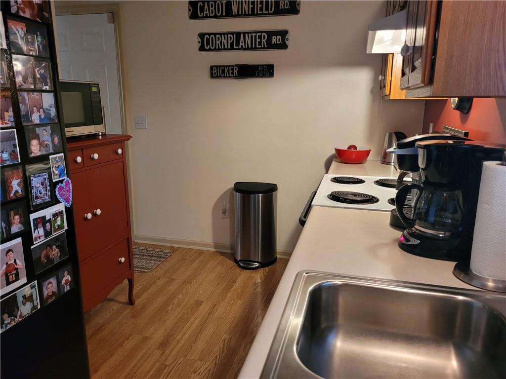 662 Great Belt Road Butler, PA 16002 - Photo 20 of 25 a kitchen with a refrigerator and a sink