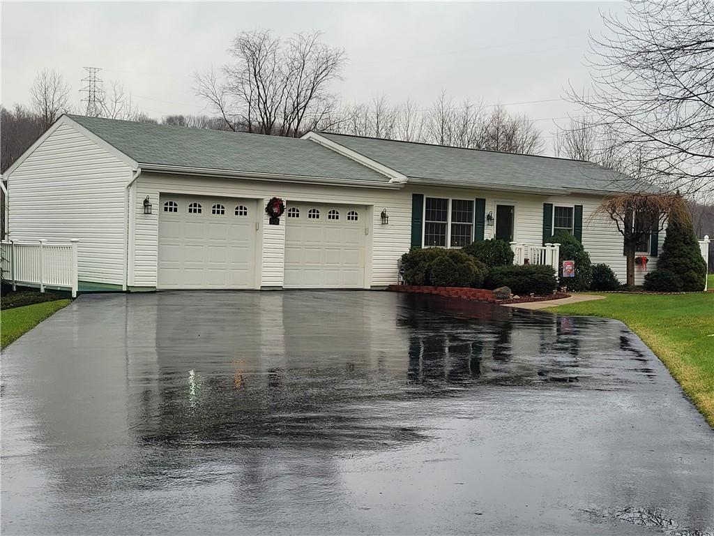 662 Great Belt Road Butler, PA 16002 - Photo 3 of 25 a front view of a house with garden
