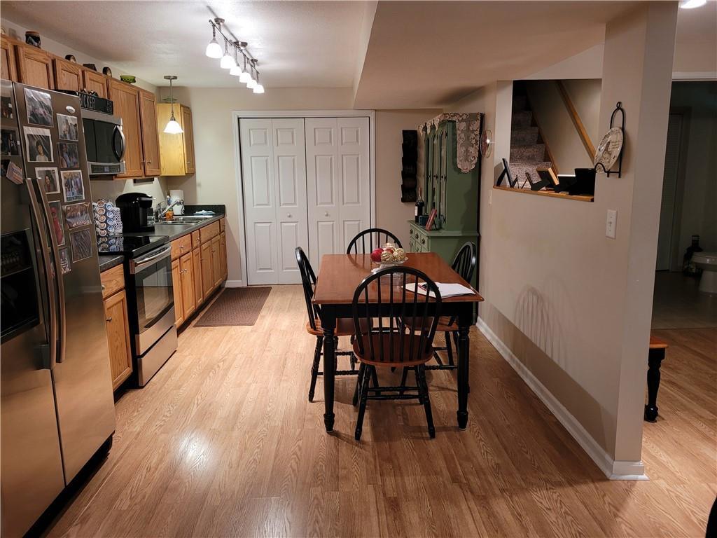 662 Great Belt Road Butler, PA 16002 - Photo 25 of 25 a view of a dining room with furniture and wooden floor