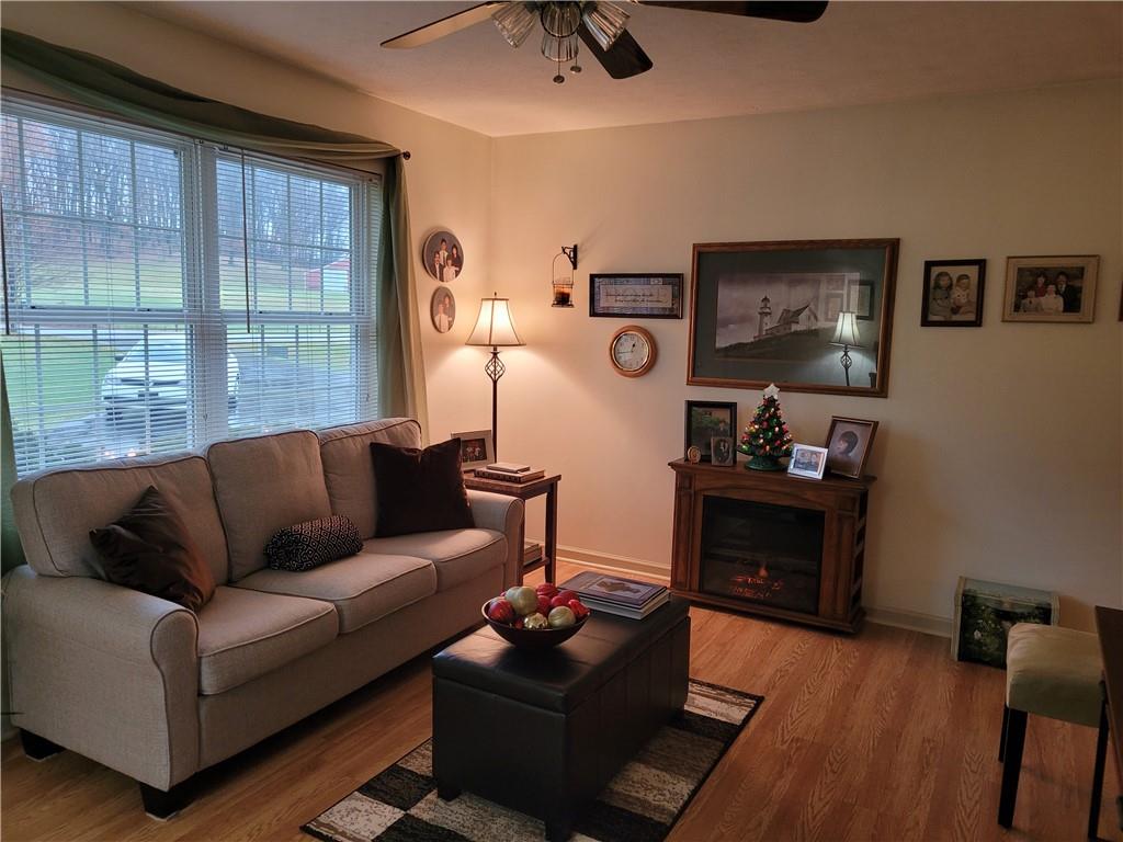 662 Great Belt Road Butler, PA 16002 - Photo 7 of 25 a living room with furniture and a flat screen tv