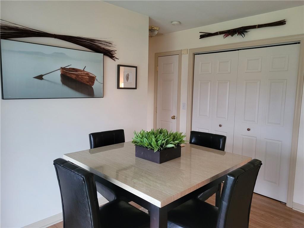 662 Great Belt Road Butler, PA 16002 - Photo 10 of 25 a room with a table and a potted plant