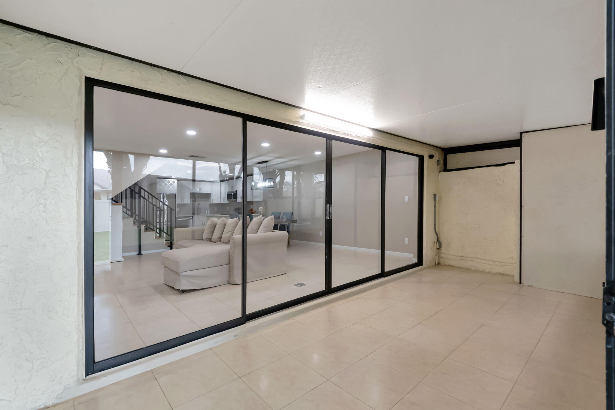 23424 Southwest 53rd Avenue, Unit B Boca Raton, FL 33433 - Photo 22 of 38 SUNROOM