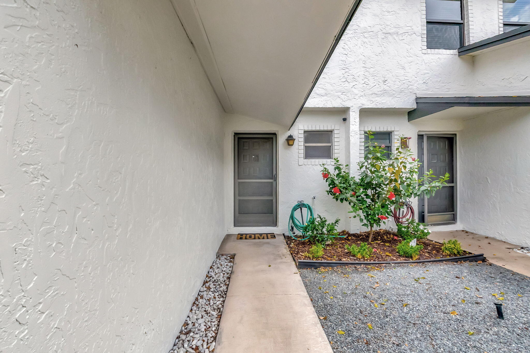 23424 Southwest 53rd Avenue, Unit B Boca Raton, FL 33433 - Photo 3 of 38 ENTRANCE