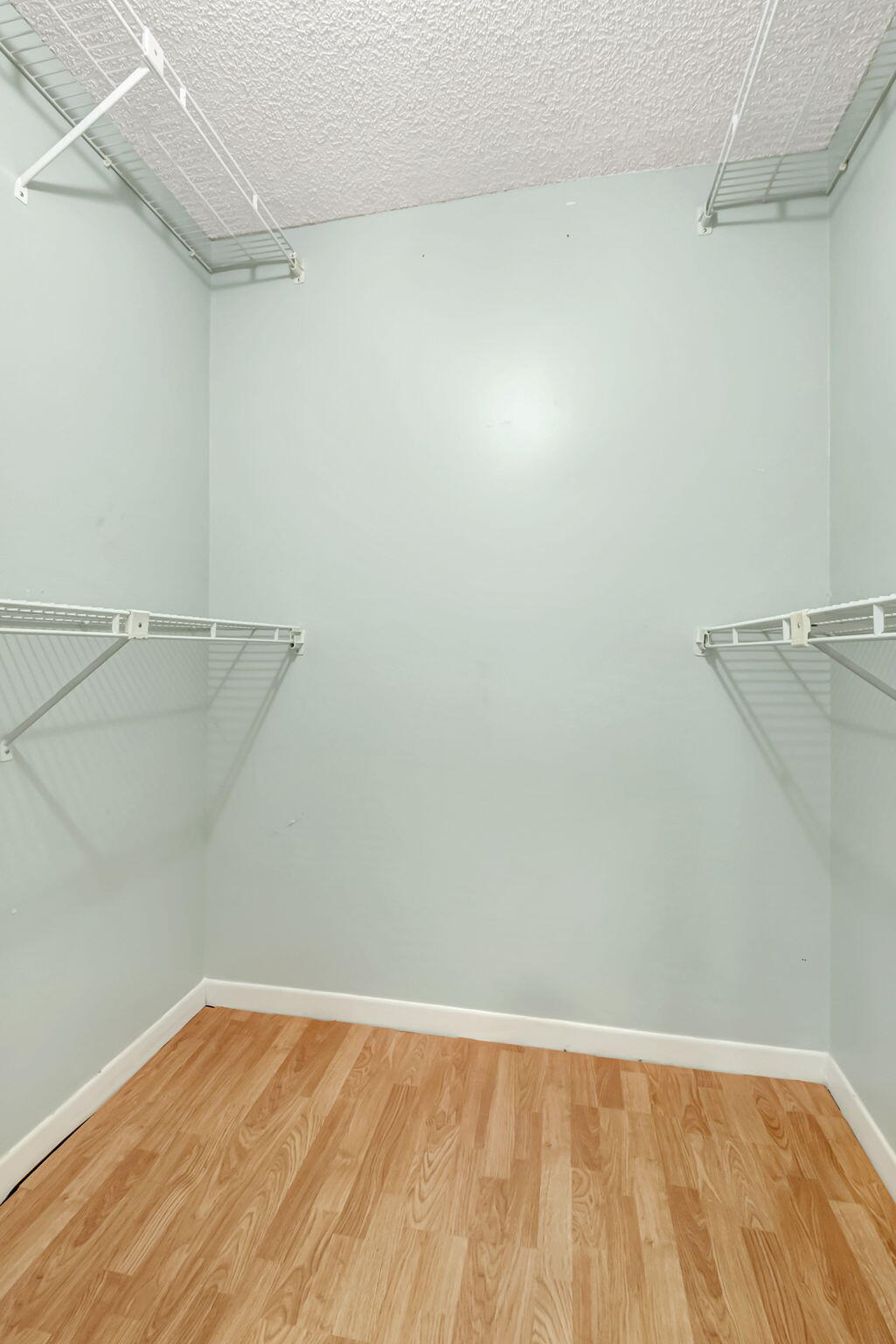 23424 Southwest 53rd Avenue, Unit B Boca Raton, FL 33433 - Photo 32 of 38 MAIN BEDROOM WALKTHROUGH CLOSET