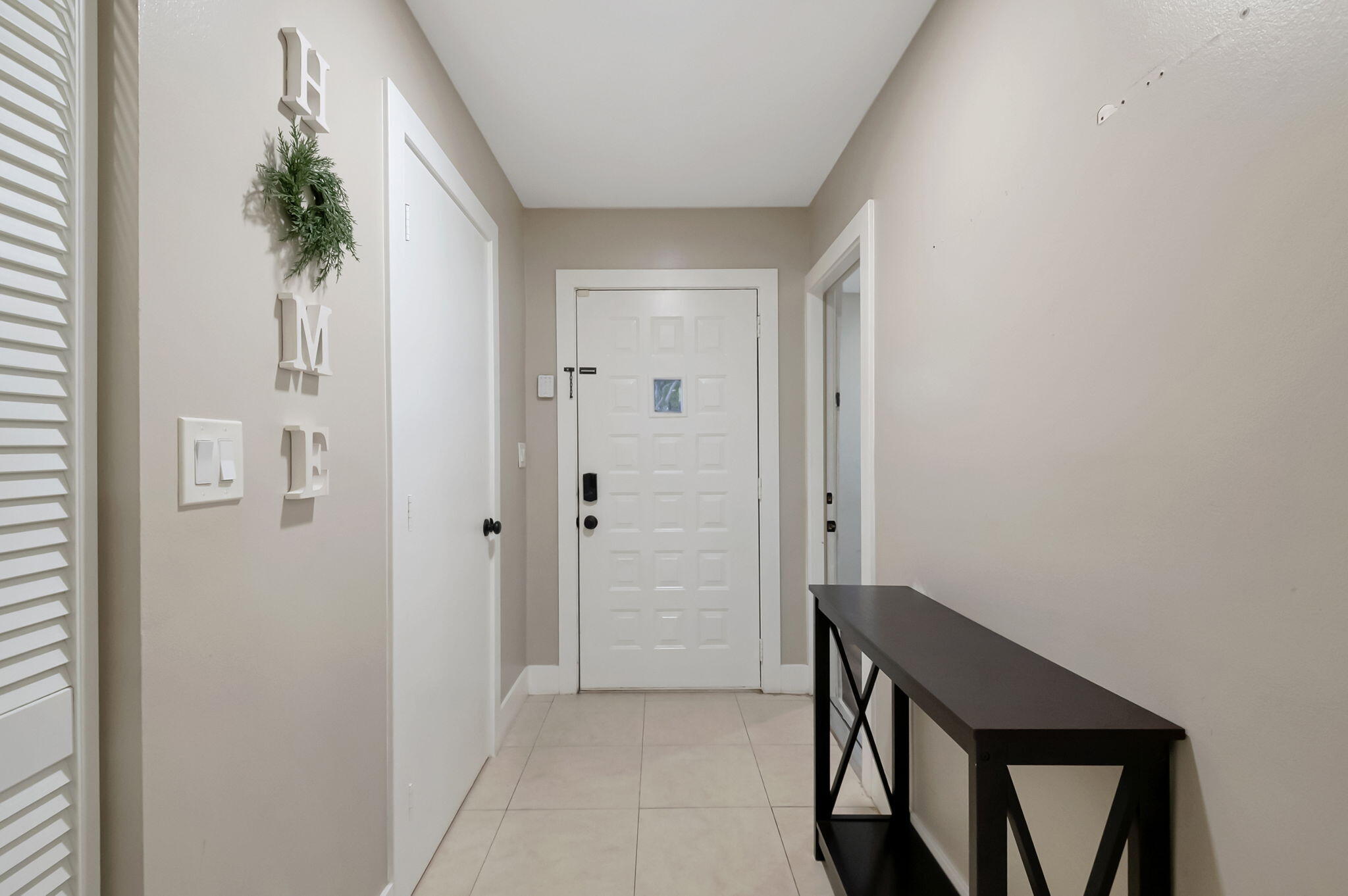 23424 Southwest 53rd Avenue, Unit B Boca Raton, FL 33433 - Photo 6 of 38 HALLWAY ENTRANCE