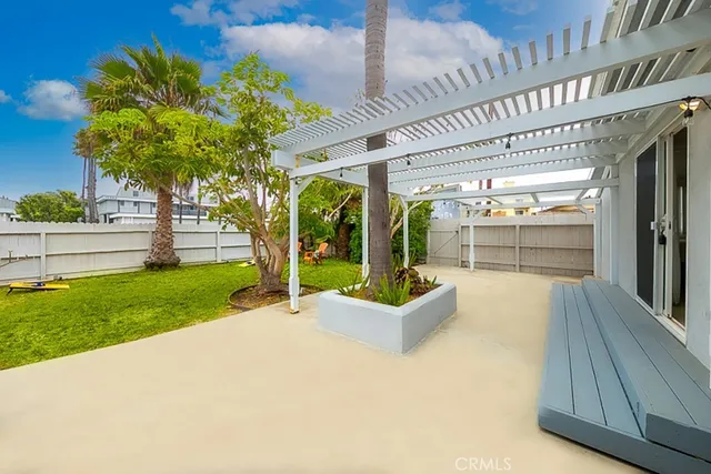 a view of swimming pool with an outdoor seating