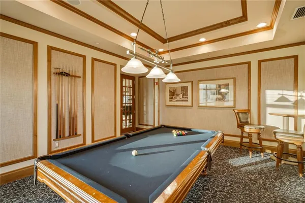 a living room with hard wood floor