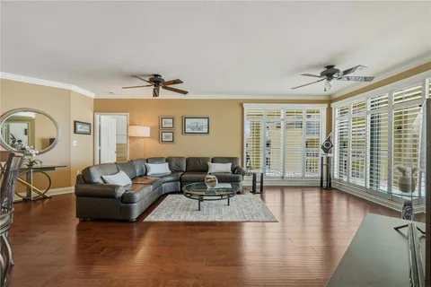 a bathroom with a double vanity sink mirror and toilet