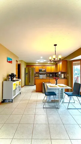 a view of a terrace with chairs