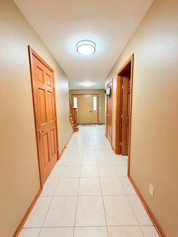 a hallway with seating space