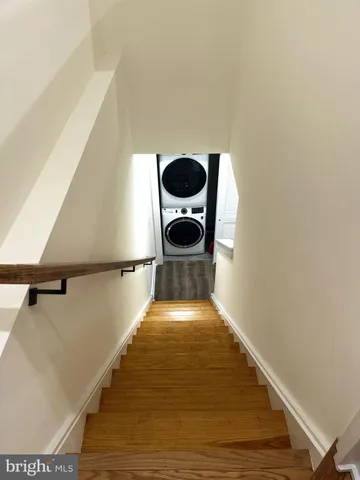 a bedroom with a bed and cabinets