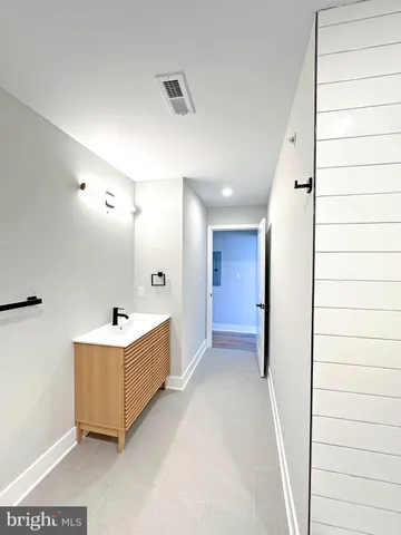 a bathroom with a sink toilet a shower and bathtub