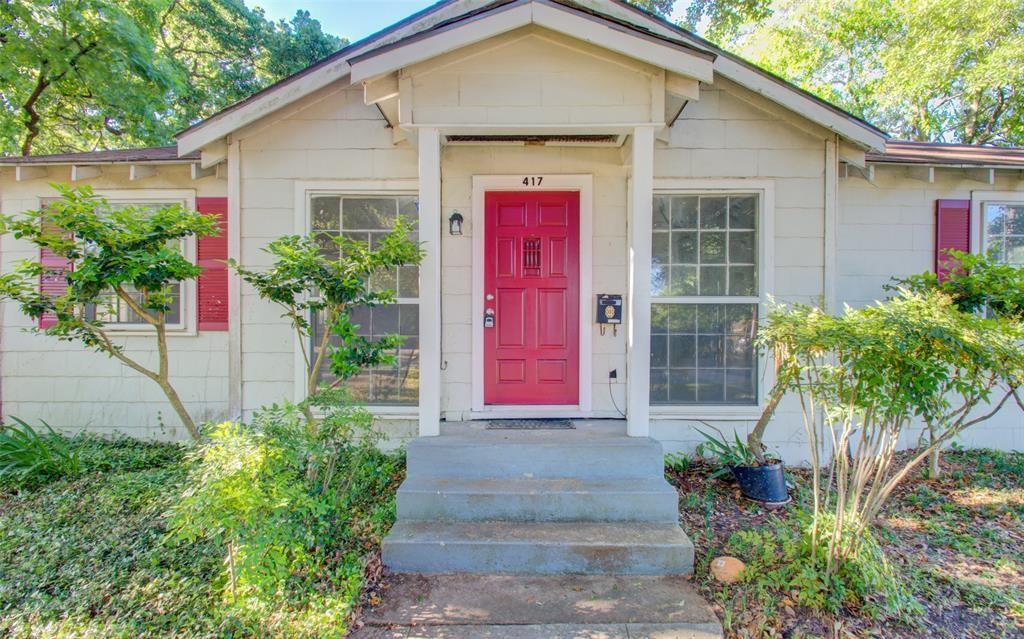 417 Sue Street, Unit A Houston, TX 77009 - Photo 11 of 11 a front view of a house with a yard and plants