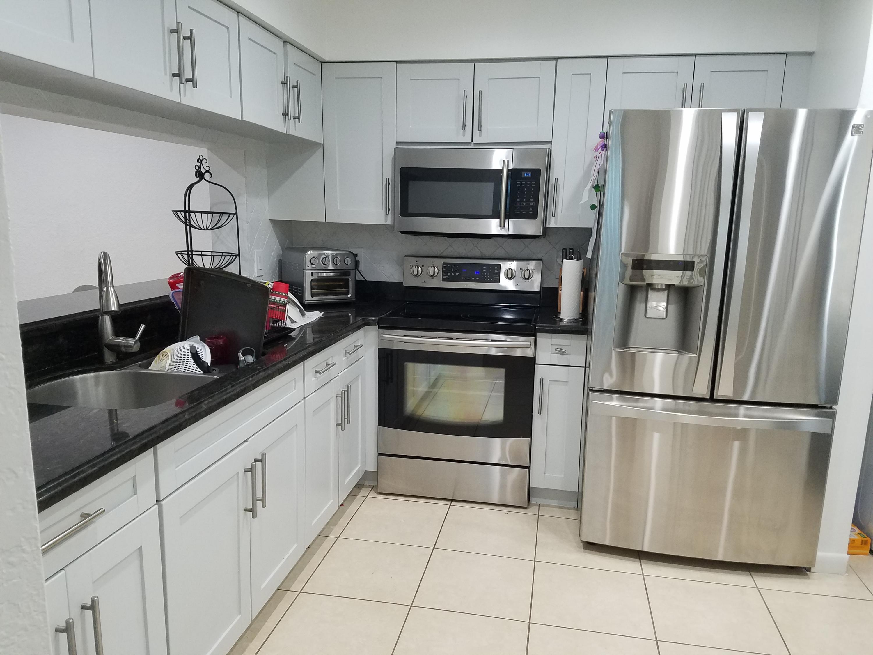 9112 Southwest 21st Court, Unit A Boca Raton, FL 33428 - Photo 8 of 28 Updated Kitchen