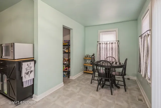 a view of a livingroom with furniture and window