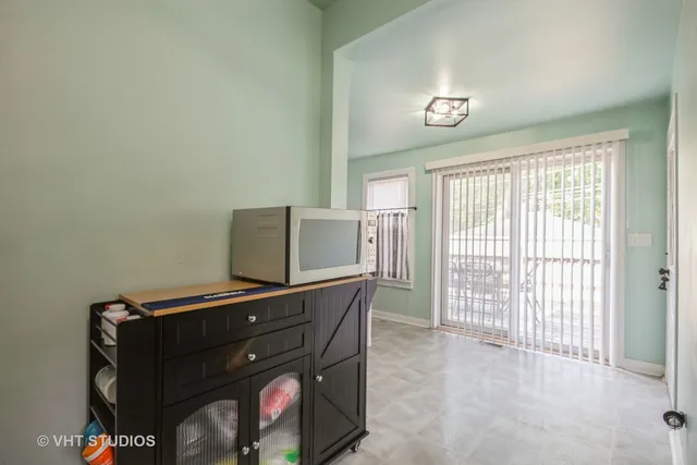 a view of workspace with furniture and window
