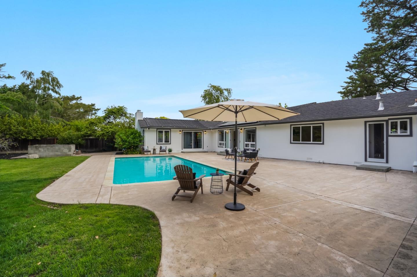 309 Darrell Road Burlingame, CA 94010 - Photo 16 of 94 a view of a house with a yard patio and a slide