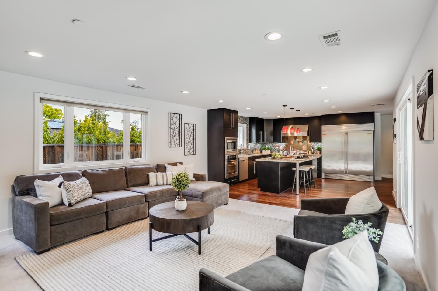 309 Darrell Road Burlingame, CA 94010 - Photo 18 of 94 a living room with furniture and a large window