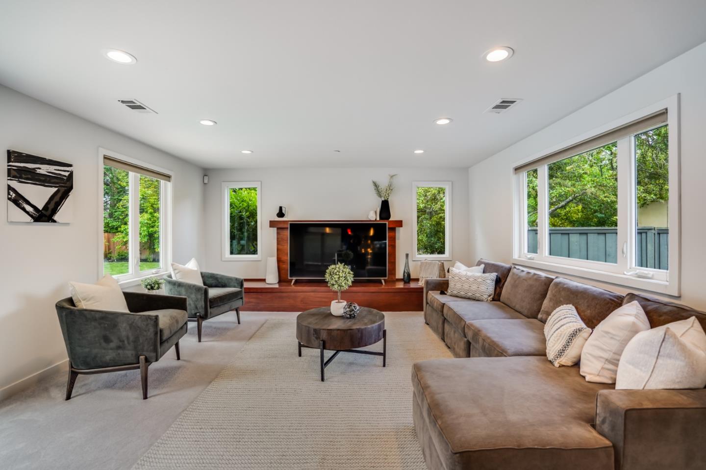 309 Darrell Road Burlingame, CA 94010 - Photo 20 of 94 a living room with furniture and a fireplace