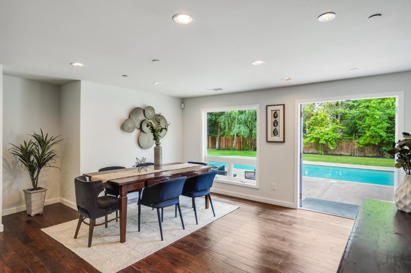 309 Darrell Road Burlingame, CA 94010 - Photo 36 of 94 a view of a dining room with furniture window and wooden floor