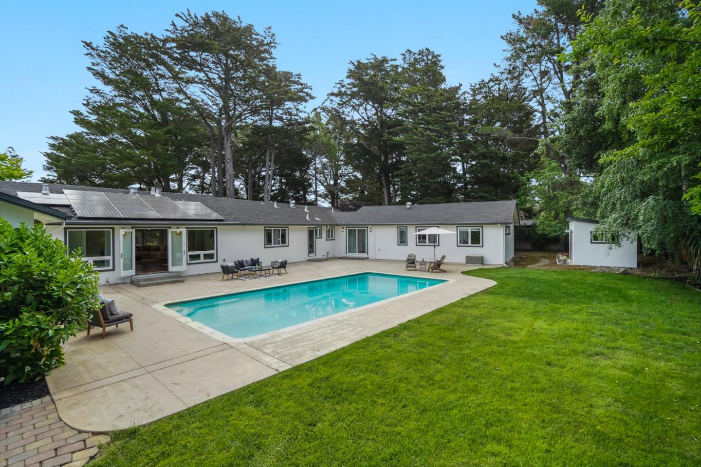 309 Darrell Road Burlingame, CA 94010 - Photo 4 of 94 a front view of a house with swimming pool and furniture