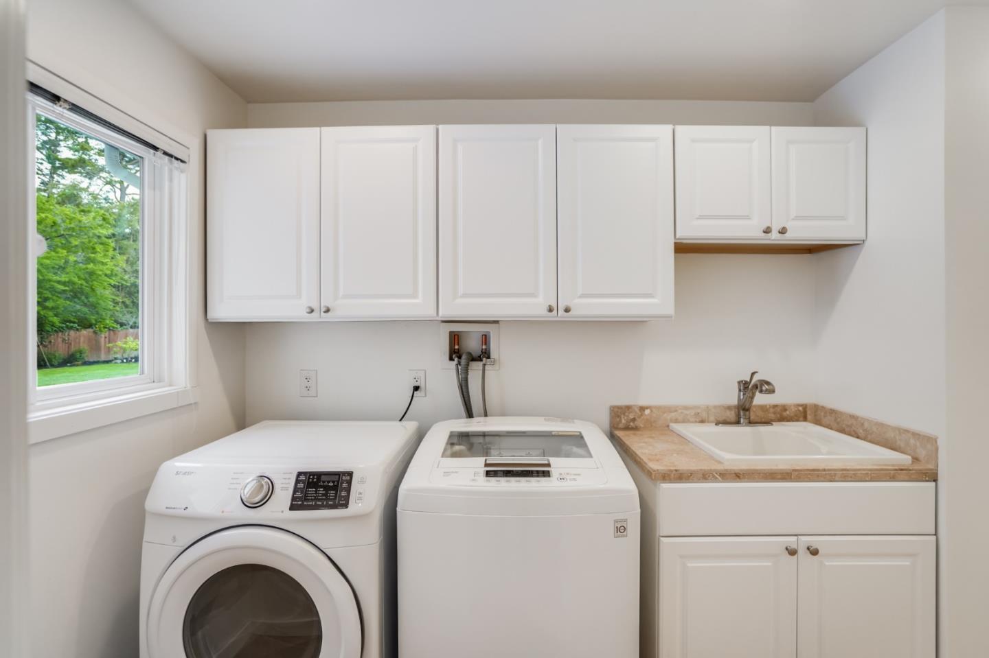 309 Darrell Road Burlingame, CA 94010 - Photo 63 of 94 a utility room with dryer and washer