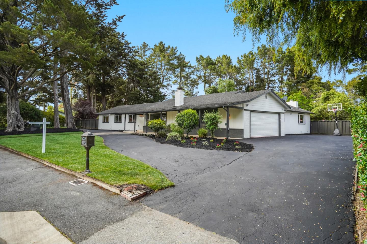 309 Darrell Road Burlingame, CA 94010 - Photo 7 of 94 a front view of a house with a yard