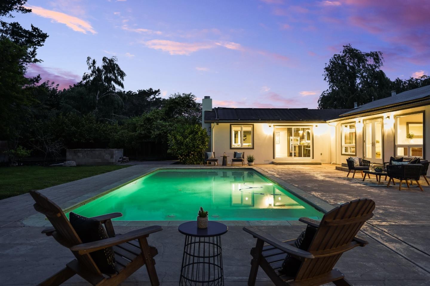 309 Darrell Road Burlingame, CA 94010 - Photo 93 of 94 a swimming pool with barbeque oven table and chairs