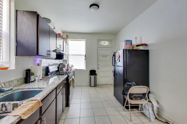 $455,000 | 6149 South Rhodes Avenue, Chicago, IL 60637