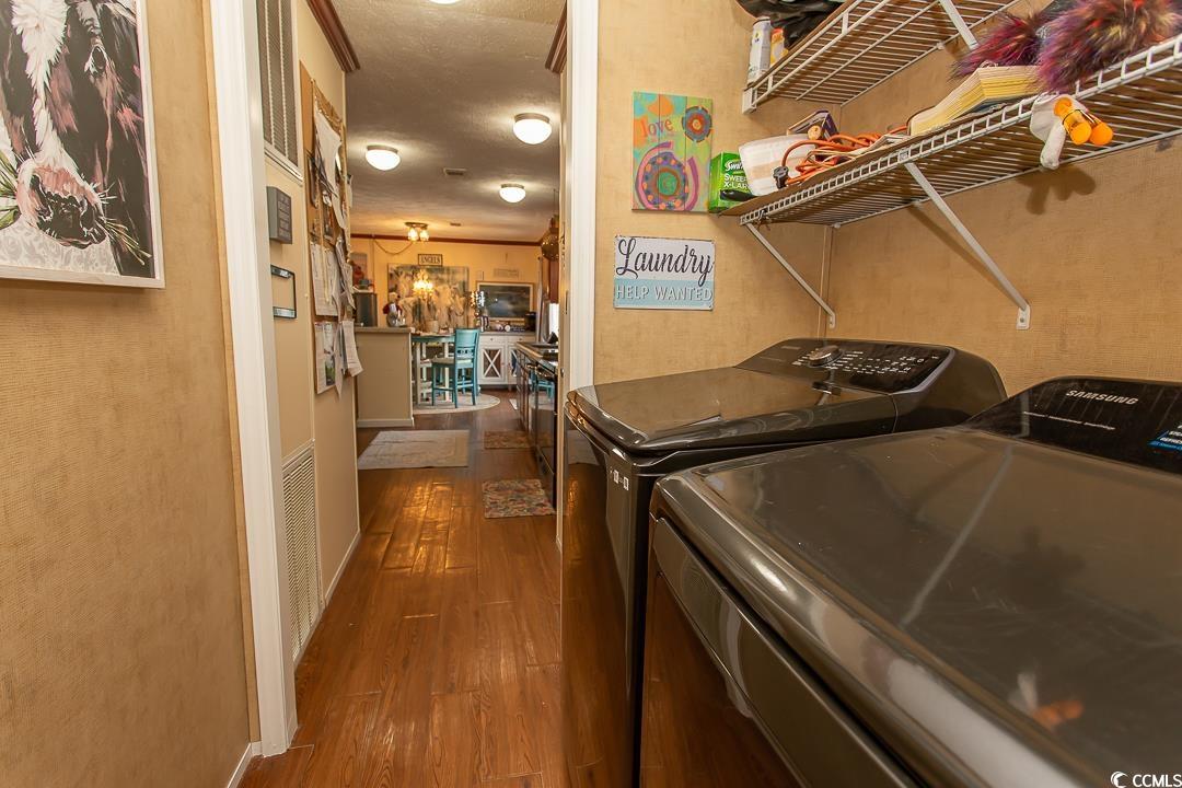 1051 Hunter Way Conway, SC 29526 - Photo 13 of 27 Laundry room with dark hardwood / wood-style floor