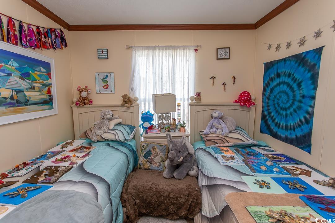 1051 Hunter Way Conway, SC 29526 - Photo 21 of 27 Bedroom featuring crown molding