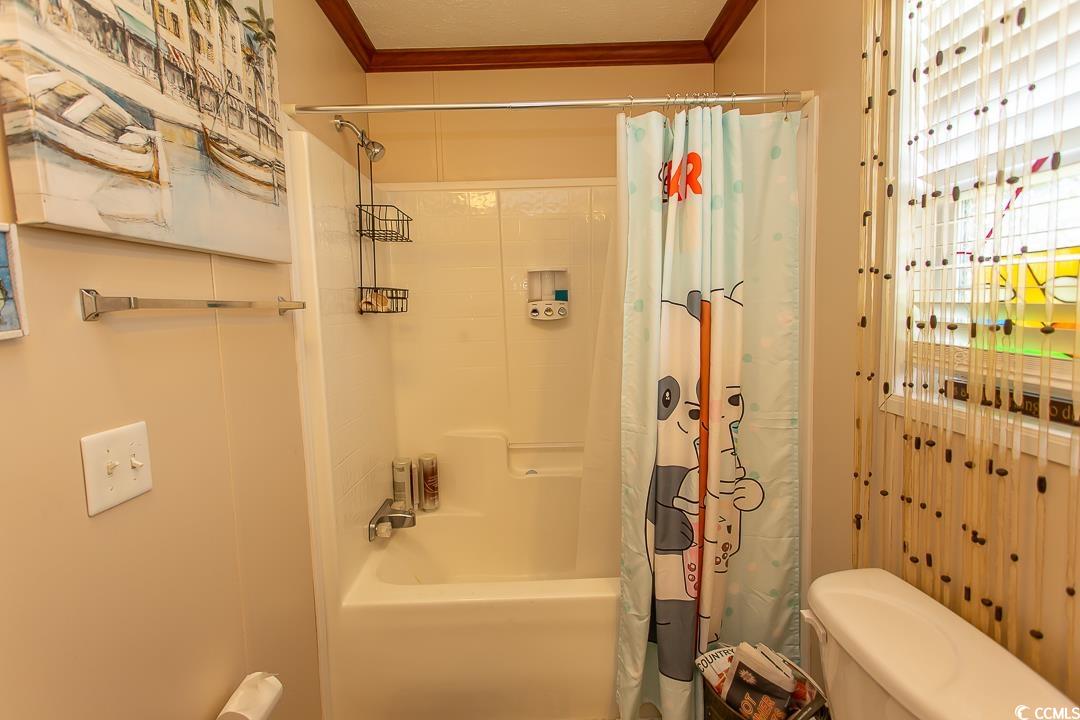 1051 Hunter Way Conway, SC 29526 - Photo 23 of 27 Bathroom featuring crown molding, shower / bathtub
