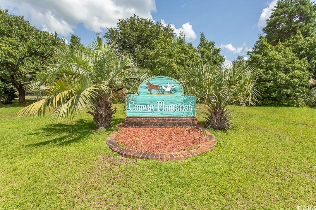 1051 Hunter Way Conway, SC 29526 - Photo 24 of 27 Community / neighborhood sign with a lawn