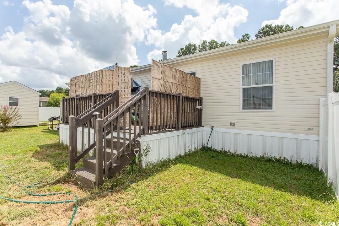 1051 Hunter Way Conway, SC 29526 - Photo 6 of 27 Back of house with a deck and a lawn