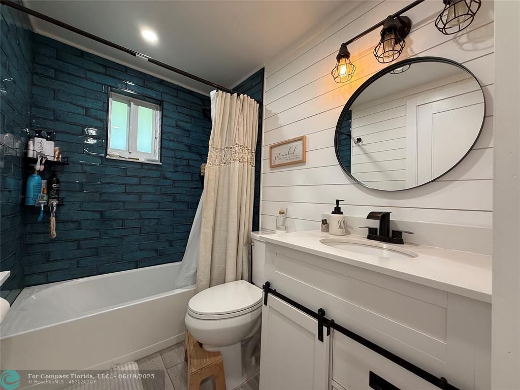 22990 Southwest 156th Avenue Miami, FL 33170 - Photo 14 of 41 a bathroom with a sink a toilet and a mirror