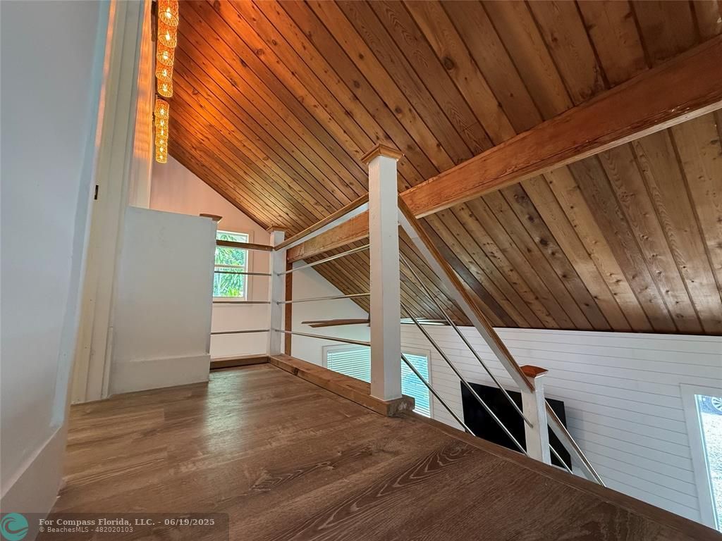 22990 Southwest 156th Avenue Miami, FL 33170 - Photo 24 of 41 a view of an empty room with stairs