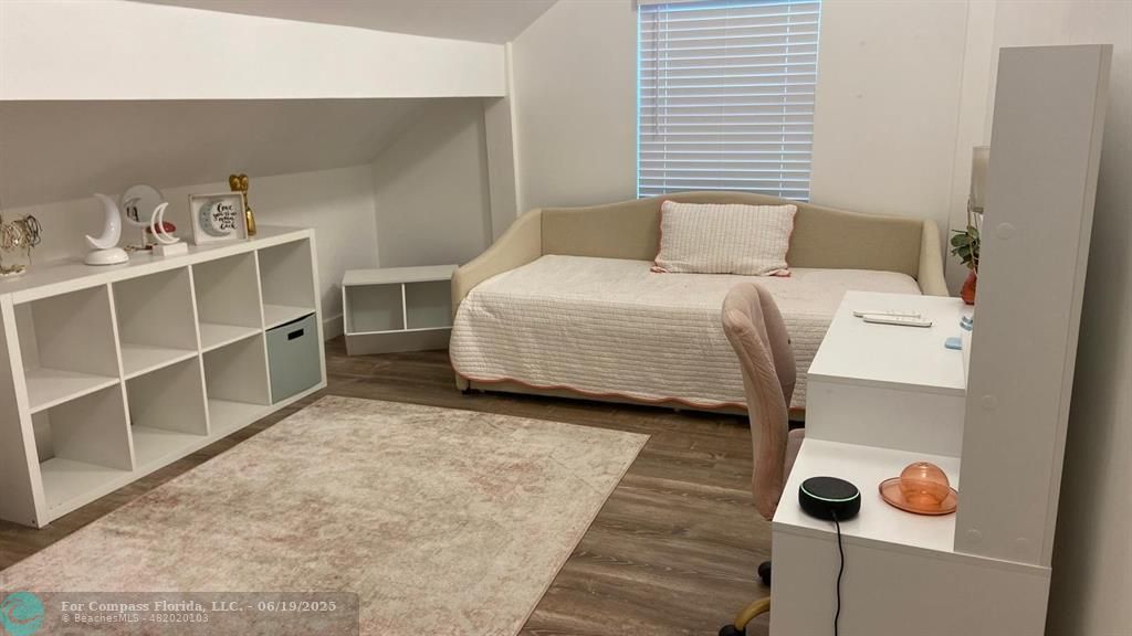 22990 Southwest 156th Avenue Miami, FL 33170 - Photo 28 of 41 a bedroom with a bed and a window