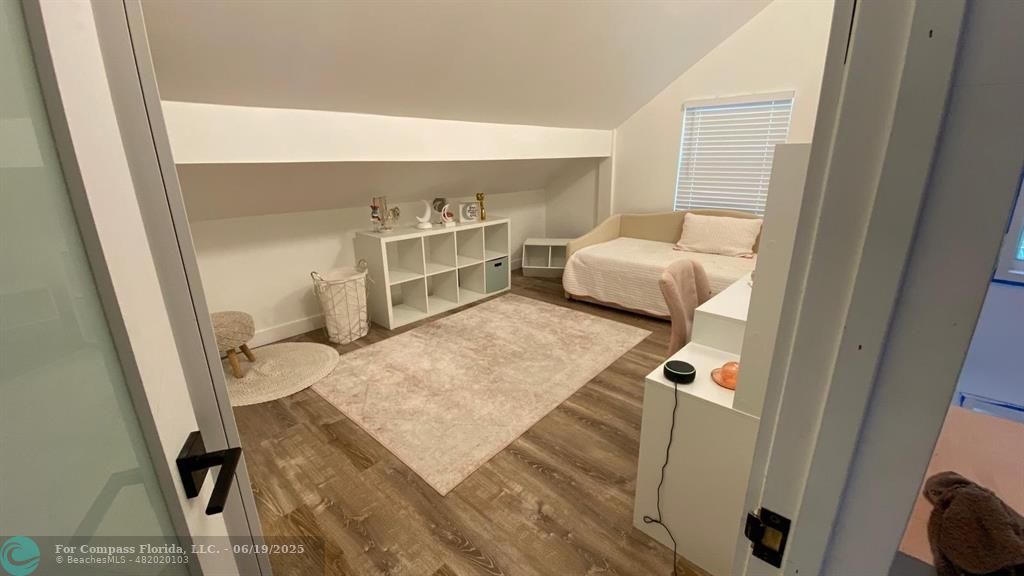 22990 Southwest 156th Avenue Miami, FL 33170 - Photo 32 of 41 a bedroom with a bed and the view of living room